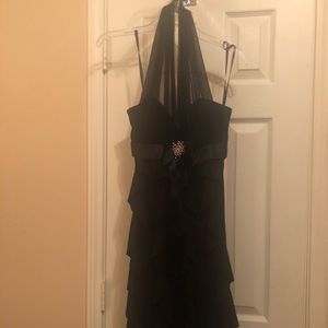 Black cocktail dress with sheer halter neckline